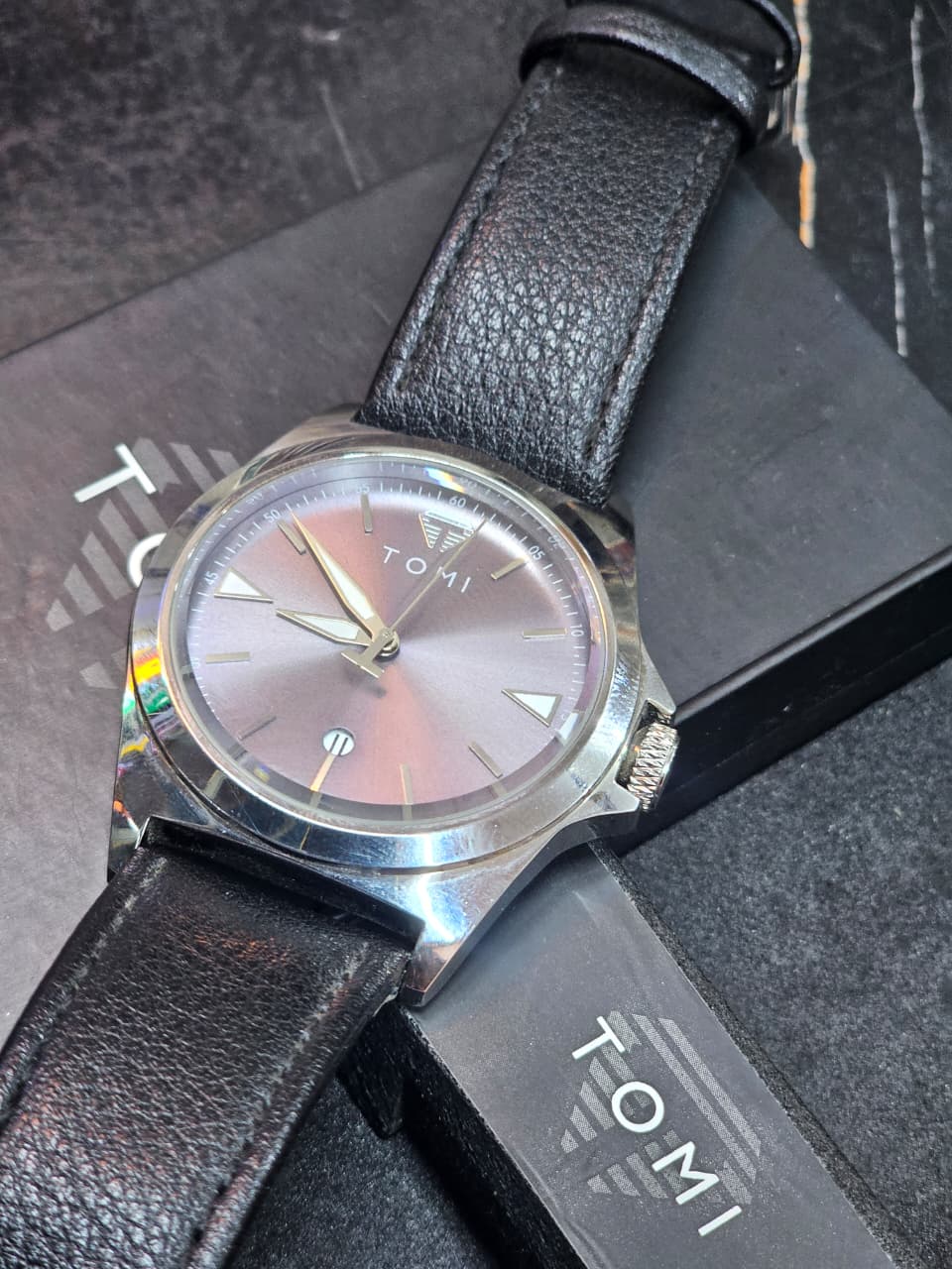 TOMI Watch